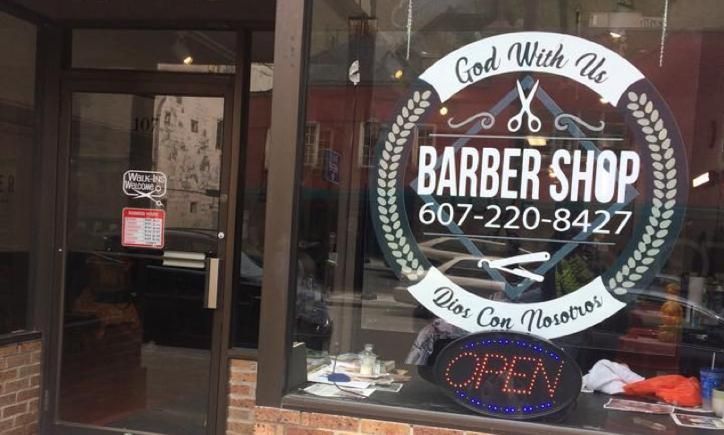 God With Us Barber Shop storefront window and entrance